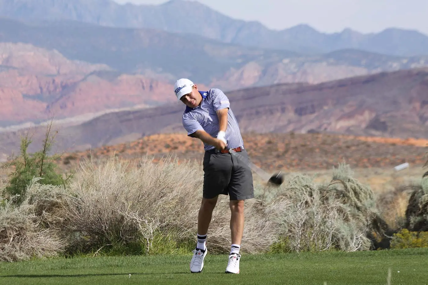 Sand Hollow Resort golf course against red sandstone in Hurricane, Utah