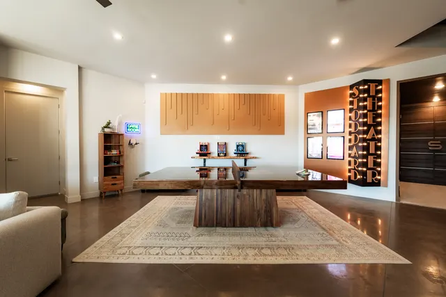 Game room with table tennis and arcade games