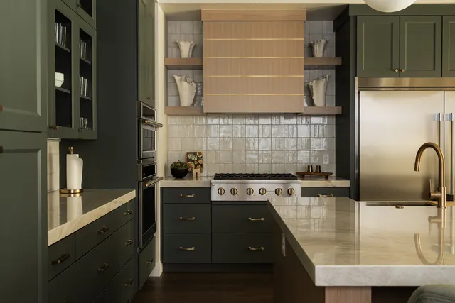 Kitchen with olive cabinetry and patterned tile